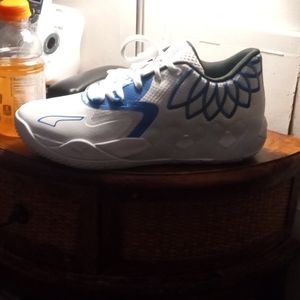 Size 10 Men blue and white M.E.L.O's